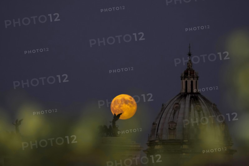 Moonrise seen  from a hotel, Rome, Italy