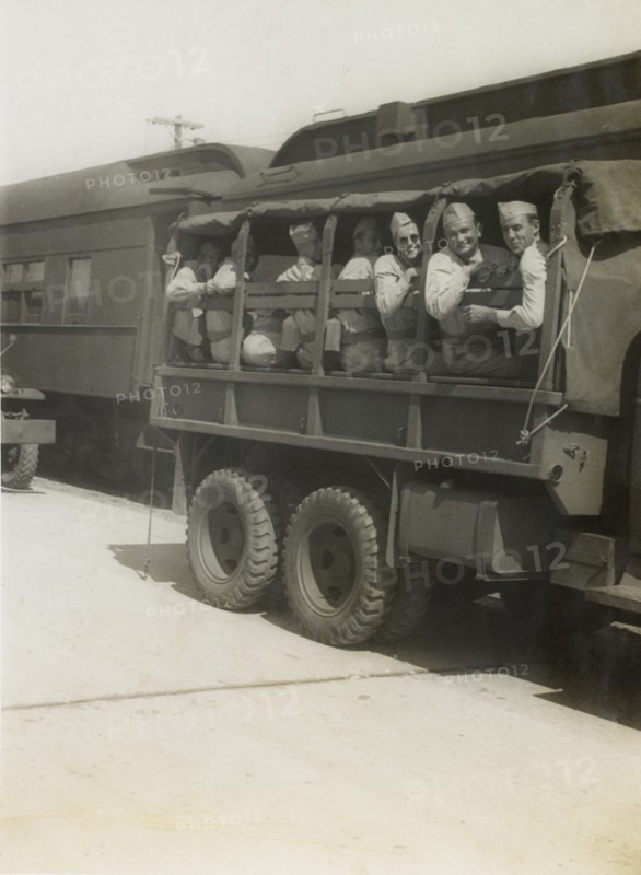 Group of Soldiers on Truck, Awaiting Departure for East Coast USA with Eventual Departure by Ship to Europe, WWII, 2nd Battalion, 389th Infantry, US Army Military Base, Indiana, USA, 1942
