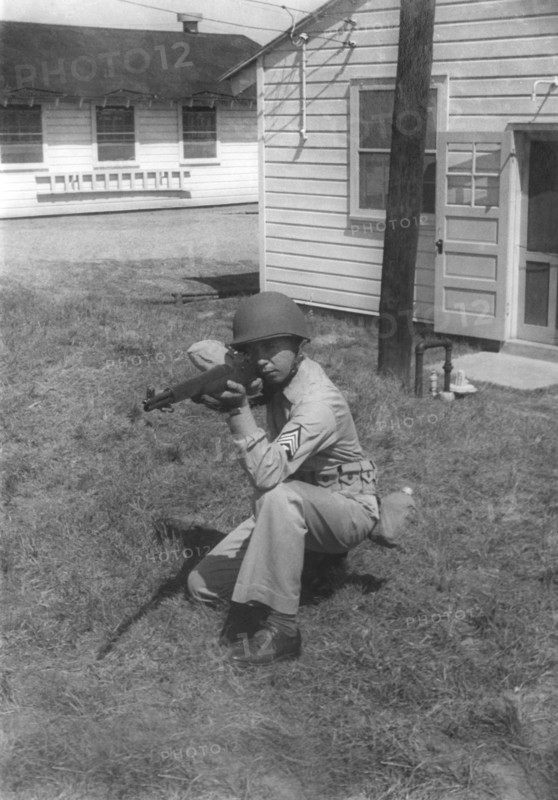Soldier Displaying Proper Shooting Position During Training Session, WWII, 2nd Battalion, 389th Infantry, US Army Military Base Indiana, USA, 1942