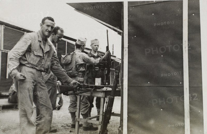Soldiers Cleaning Rifles, WWII, 2nd Battalion, 389th Infantry, US Army Military Base Indiana, USA, 1942