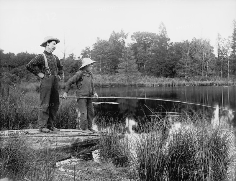 Man and Boy Fishing in Lake, USA, Detroit Publishing Company, 1915