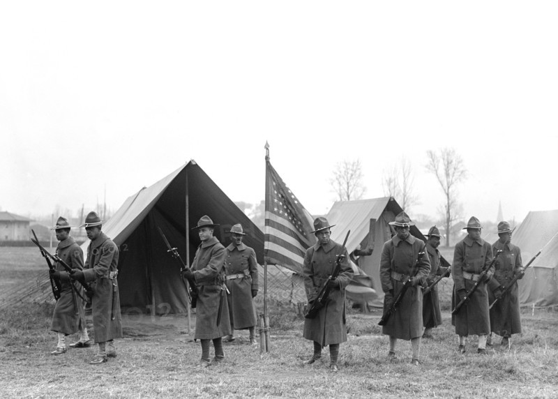 African-American Troops, Portrait Near Tents and American Flag, Harris & Ewing, 1917