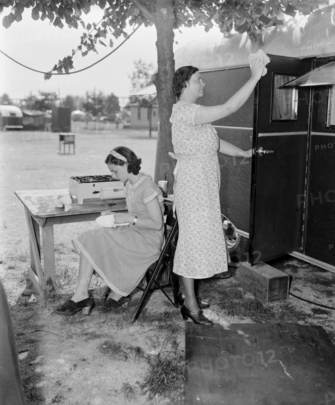 Mother and Daughter Doing Chores at Trailer Camp, Harris & Ewing, June 4, 1937