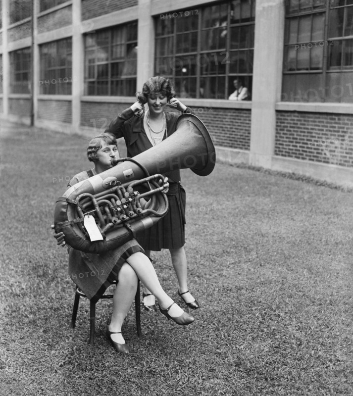 Woman Playing Tuba While Another Woman is Plugging her Ears, USA, Harris & Ewing, 1928