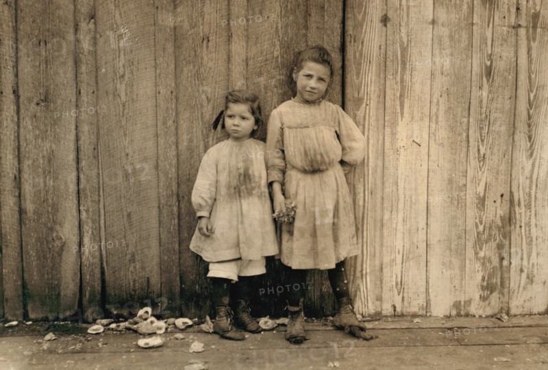 Portrait of Two Young Girls who Work as Shrimp Pickers at Peerless Oyster Company, Bay St. Louis, Mississippi, USA, Lewis Hine, 1911