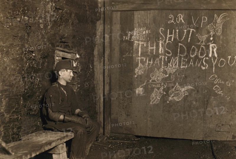 Portrait of 15-year Old Boy Working as Trapper at Coal Mine, His only Job is to Open and Close the Door, West Virginia, USA, Lewis Hine, 1908