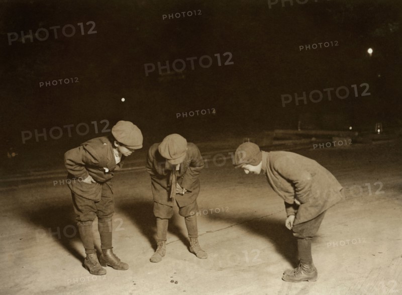 Three Young Boys Playing Crap Game near Post Office at Midnight, Providence, Rhode Island, USA, Lewis Hine, 1912