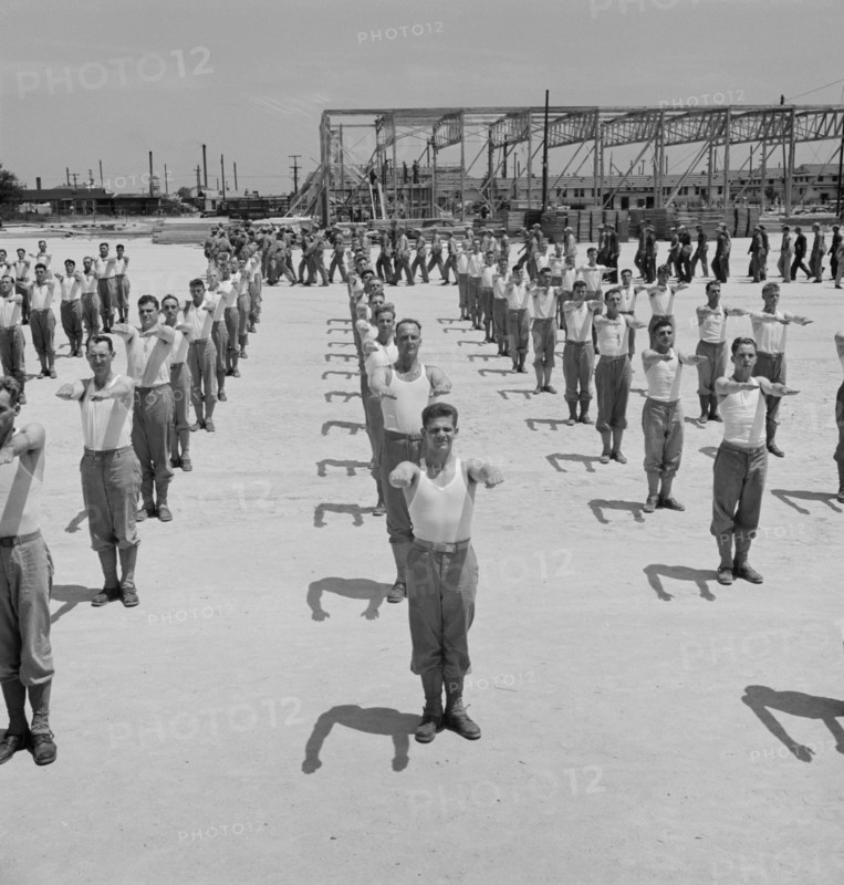 Enlisted Men Going Through Calisthenics Routine, Air Service Command, Daniel Field, Georgia, USA, Jack Delano for Office of War Information, July 1943