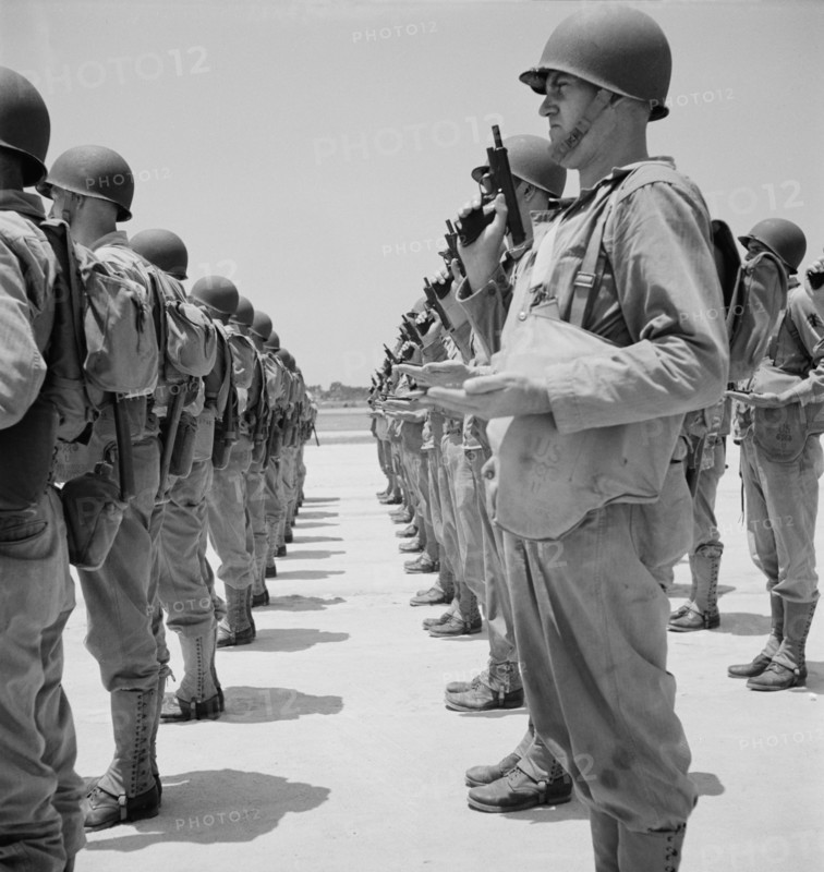 Enlisted Men Learning how to Handle a Pistol, Standing at "Inspect Pistols", Air Service Command, Daniel Field, Georgia, USA, Jack Delano for Office of War Information, July 1943