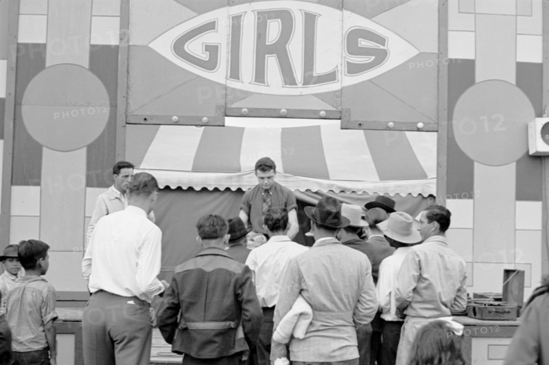 Ticket Seller at Carnival, Brownsville, Texas, USA, Arthur Rothstein for Farm Security Administration, February 1942