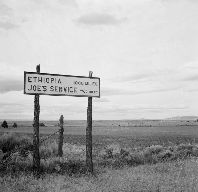 Sign on Highway near Madras, Oregon, USA, Arthur Rothstein for Farm Security Administration, July 1936