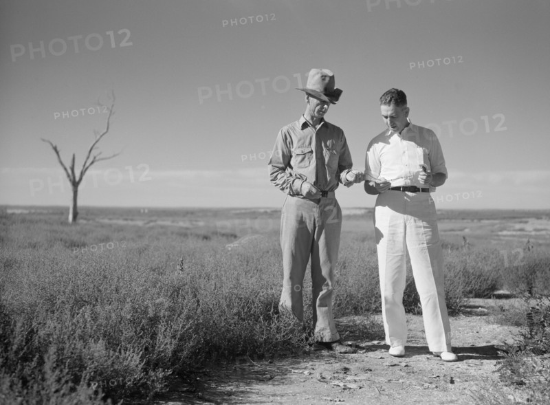 Dr. Tugwell and Farmer of Dust Bowl in Panhandle Area, President's Report, Texas, USA, Arthur Rothstein for Farm Security Administration, July 1936