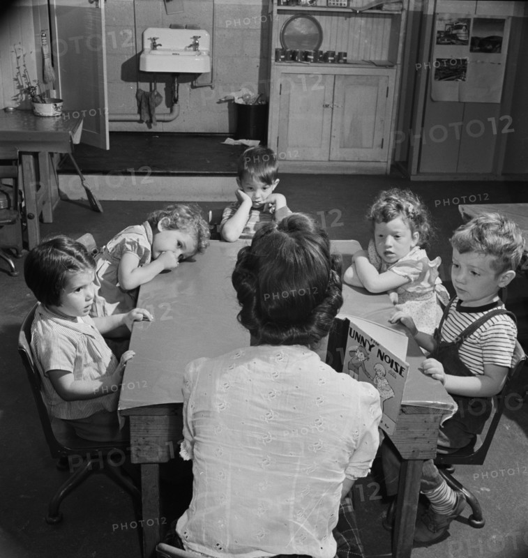 Story Hour, Nursery School in Federal Housing Project run Cooperatively by Mothers, Greenbelt, Maryland, USA, Marjorie Collins for Farm Security Administration, May 1942