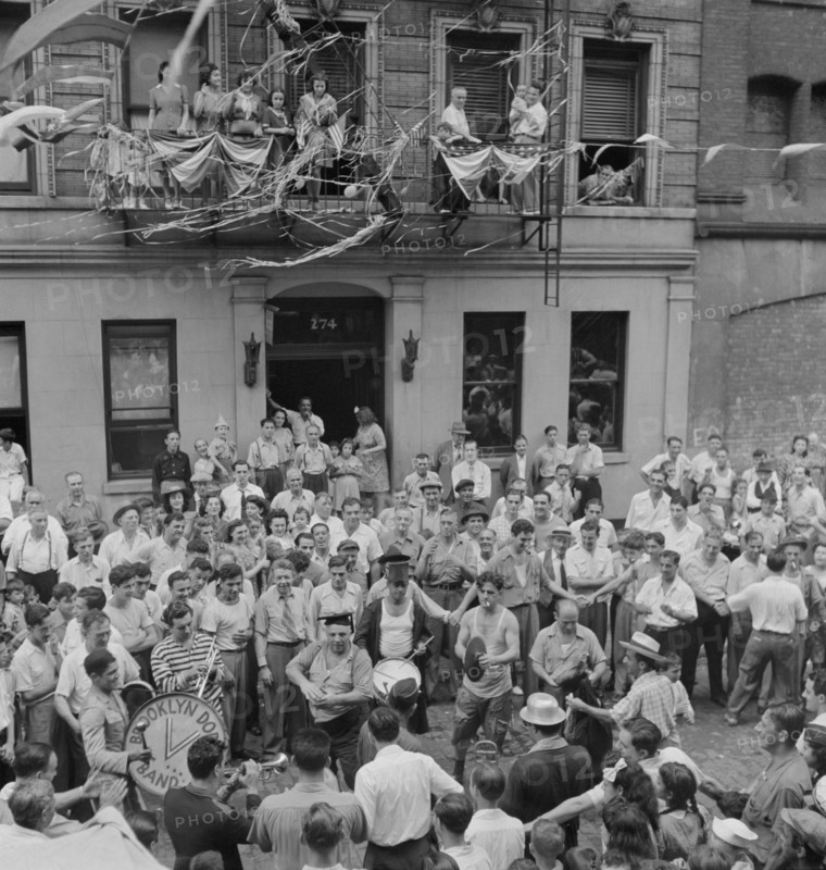 Dancing and Music on Mott Street at Flag Raising Ceremony in Honor of Neighborhood Boys in the U.S. Army, New York City, New York, USA, Marjorie Collins for Office of War Information, August 1942