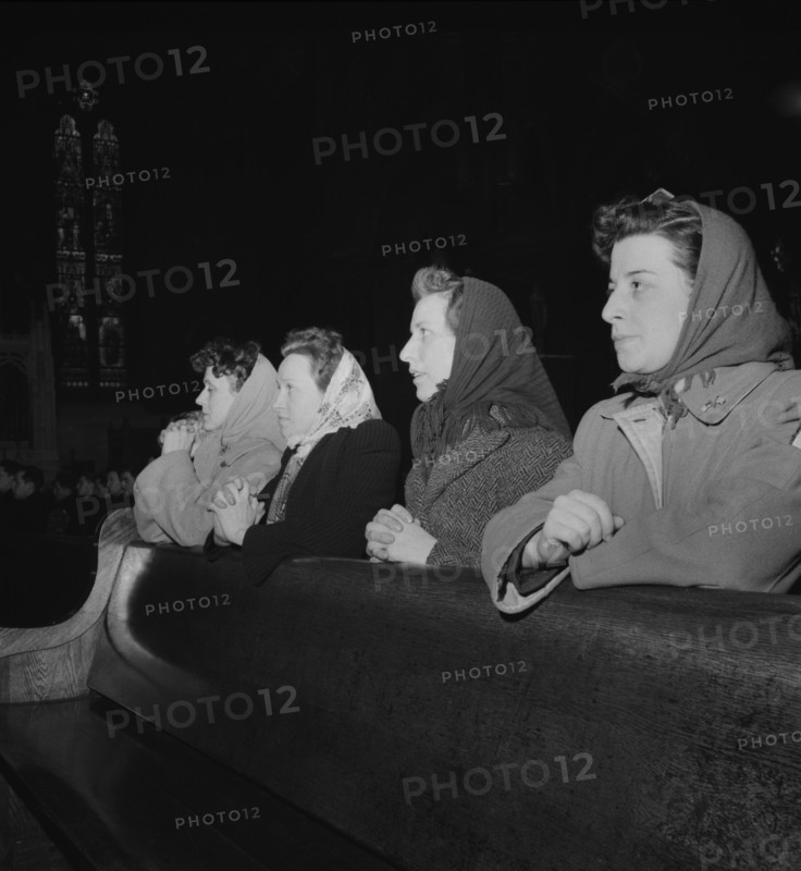 Women Factory Workers Attending Mass at 9am Sunday Directly after Working Third Shift, Buffalo, New York, USA, Marjorie Collins for Office of War Information, April 1943