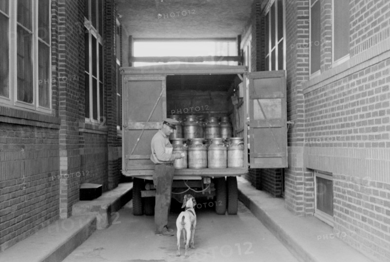 Worker at Milk Receiving Station, Farmington, Minnesota, USA, Arthur Rothstein for Farm Security Administration (FSA), September 1939