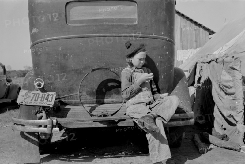 Migrant Girl Sitting on Back of Car, Westlaco, Texas, USA, Russell Lee, February 1939