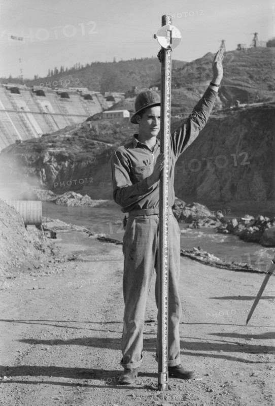 Rod Man with Surveying Crew, Shasta Dam, Shasta County, California, USA, Russell Lee, December 1941