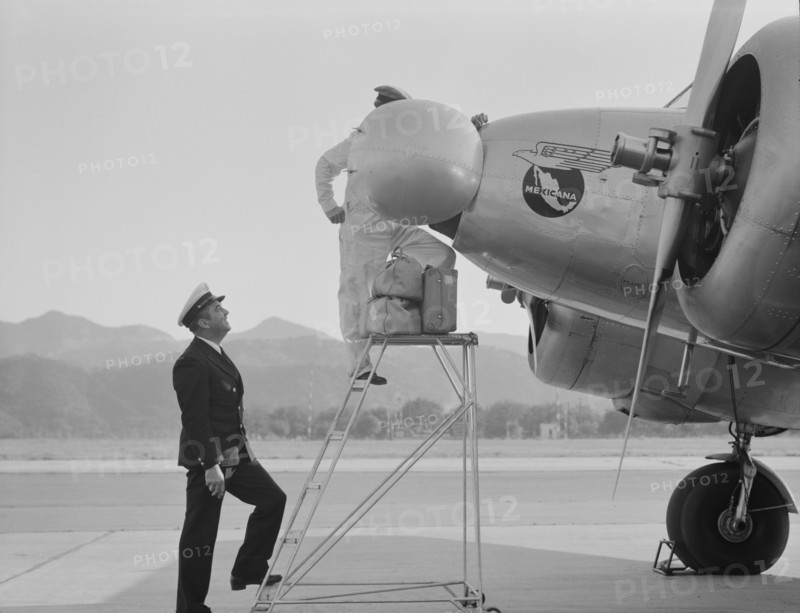 Plant Quarantine Inspectors Examining Airplane at Airport, Glendale, California, USA, Dorothea Lange for Farm Security Administration, May 1937
