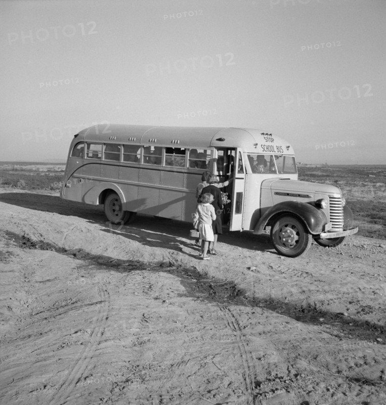 Children Getting on School Bus, Dead Ox Flat, Malheur County, Oregon, USA, Dorothea Lange for Farm Security Administration, October 1939