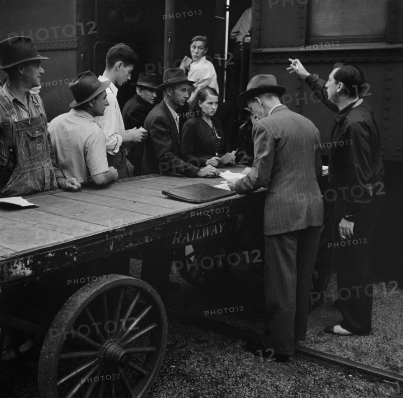 People Boarding Train for Batavia, New York, where they will help with Harvest, Richwood, West Virginia, USA, John Collier for Farm Security Administration, September 1942