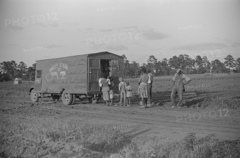 Rolling Store Selling Goods in Rural Community, near Montezuma, Georgia, USA, Marion Post Wolcott for Farm Security Administration, May 1939