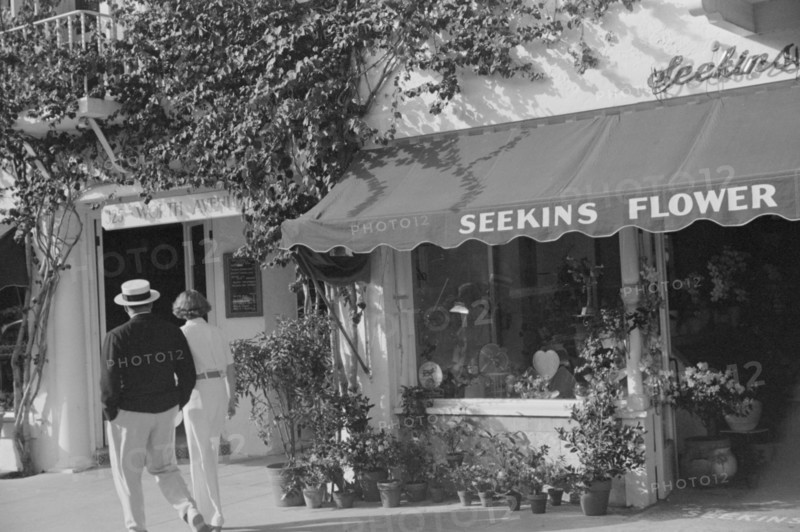Couple Walking Along Worth Avenue, Palm Beach, Florida, USA, Marion Post Wolcott for Farm Security Administration, March 1939