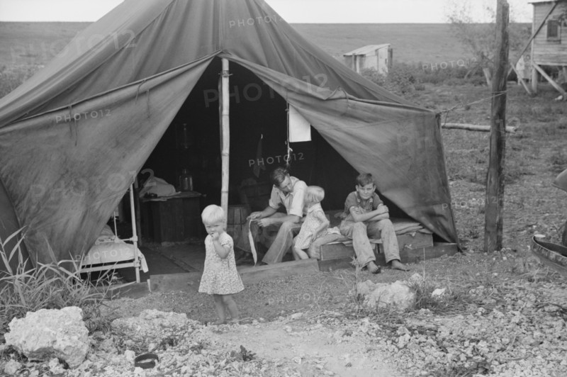 Family of Migrant Worker Living in Tent, near Canal Point Packinghouse, Florida, USA, Marion Post Wolcott for Farm Security Administration, February 1939