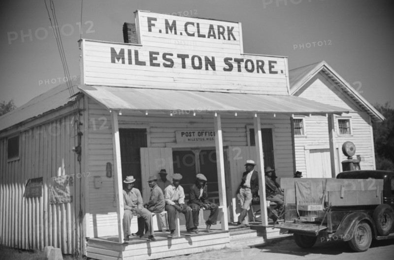 Tenant Farmers on Porch of Store and Post Office, Mileston, Mississippi, USA, Marion Post Wolcott for Farm Security Administration, October 1939