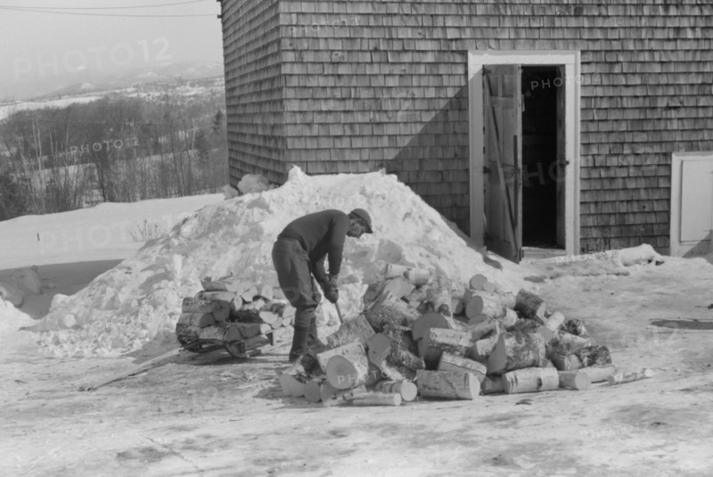 Man Splitting Wood for Winter Fuel, Lisbon, New Hampshire, USA, Marion Post Wolcott for Farm Security Administration, March 1940