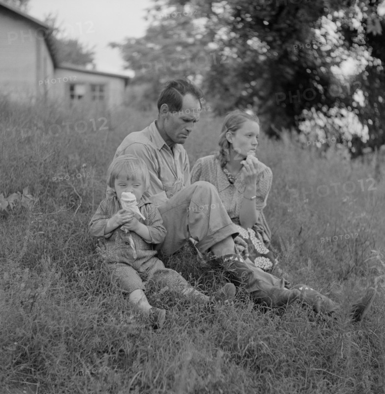 Farm Family Eating Ice Cream along Cane River on Fourth of July, near Natchitoches, Louisiana, USA, Marion Post Wolcott for Farm Security Administration, July 1940