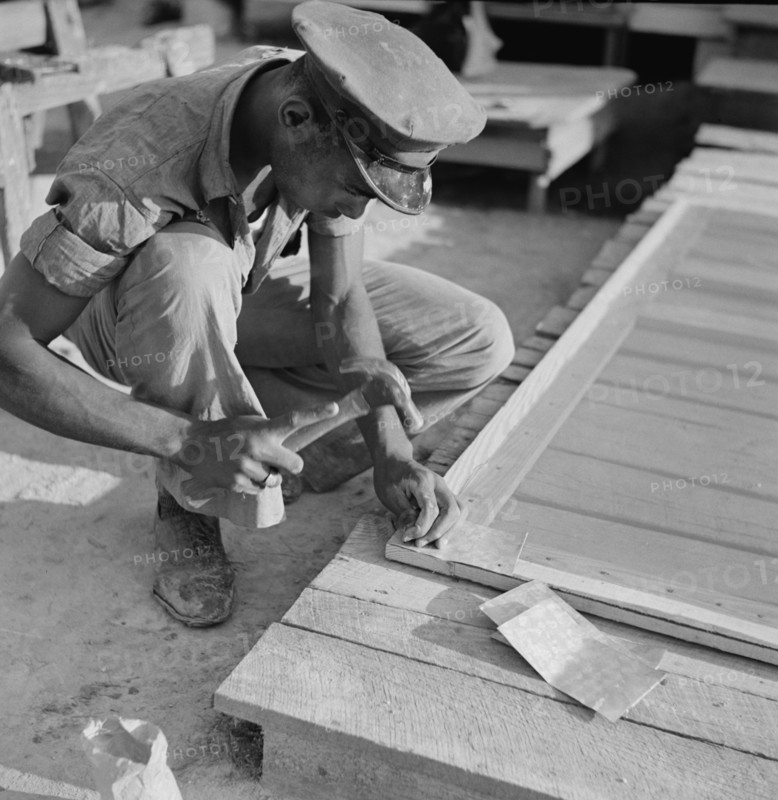 Man Building Home Screen Door, Ridge, Maryland, USA, Marion Post Wolcott for Farm Security Administration, July 1941