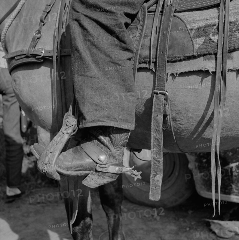 Detail of Cowboy's Boot and Spur in Stirrup at Rodeo, Ashland, Montana, Marion Post Wolcott for Farm Security Administration, July 1941