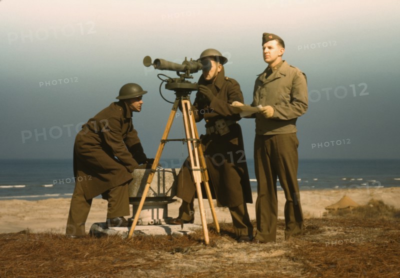 Military Personnel Operating Azimuth Instrument to Measure Angle and Splash in Sea-Target Practice, Fort Story, Virginia, USA, Alfred T. Palmer for Office of War Information, March 1942