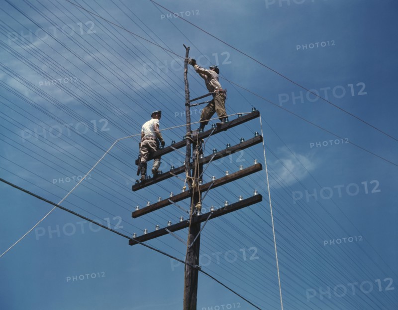Two Men Working on Telephone Lines, Tennessee, USA, Alfred T. Palmer for Office of War Information, June 1942