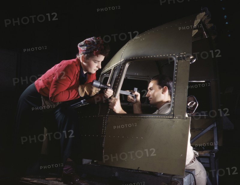 Riveting Team Working on Cockpit Shell of B-25 Bomber, North American Aviation, Inc, Inglewood, California, USA, Alfred T. Palmer for Office of War Information, October 1942