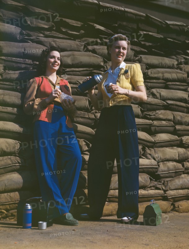 Two Female Factory Workers on Lunch Break, Douglas Aircraft Company, Long Beach, California, USA, Alfred T. Palmer for Office of War Information, October 1942