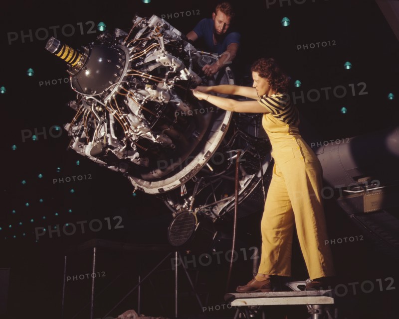 Woman Being Trained to do Vital Aircraft Engine Installation, Douglas Aircraft Company, Long Beach, California, USA, Alfred T. Palmer for Office of War Information, October 1942