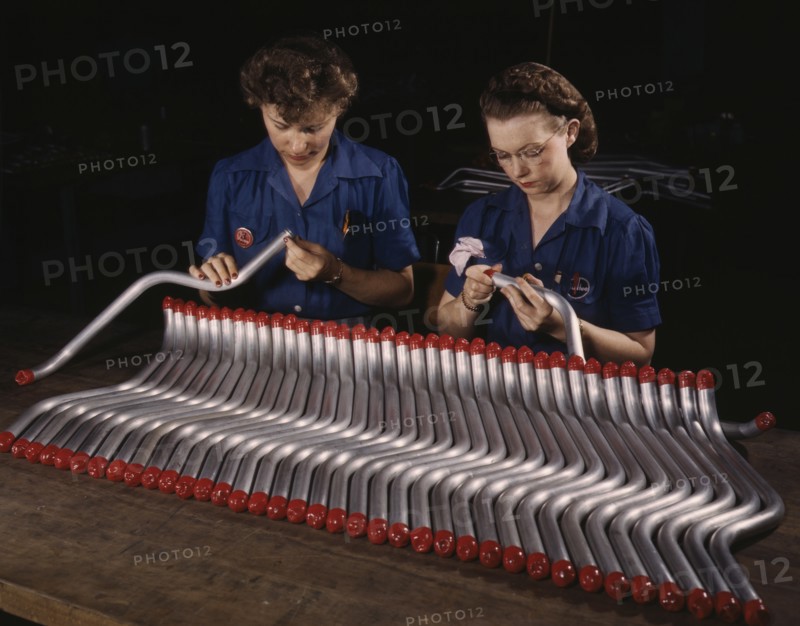 Two Female Workers Capping and Inspecting Tubing for Vultee "Vengeance" A-31 Dive Bomber, Nashville, Tennessee, USA, Alfred T. Palmer for Office of War Information, February, 1943