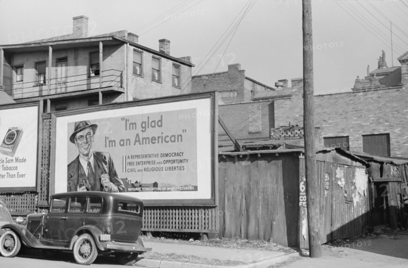 National Association of Managers Billboard, Dubuque, Iowa, USA, John Vachon for Farm Security Administration, April 1940
