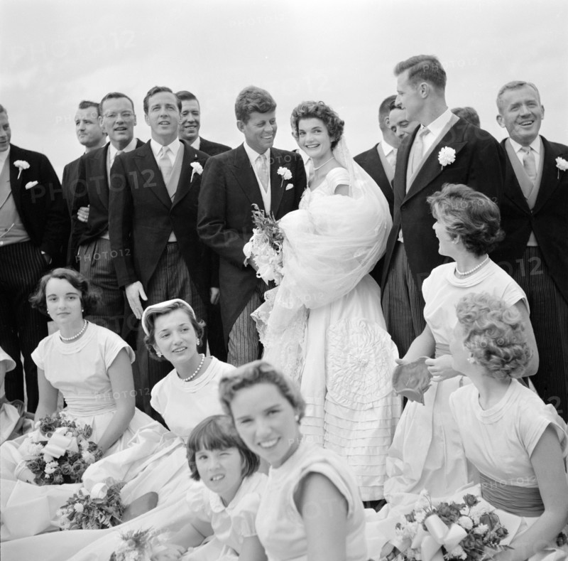 Jackie Bouvier Kennedy and John F. Kennedy, in Wedding Attire, with Members of Wedding Party, Newport, Rhode Island, USA, by Toni Frissell, September 12, 1953