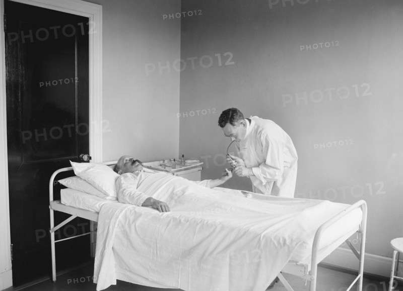Doctor Examining Patient in Hospital, USA, National Photo Company, 1922