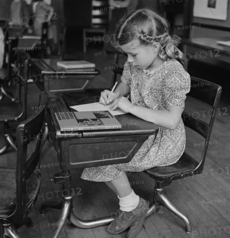 Young Girl Studying in Class, Southington, Connecticut, USA, Fenno Jacobs for Office of War Information, May 1942
