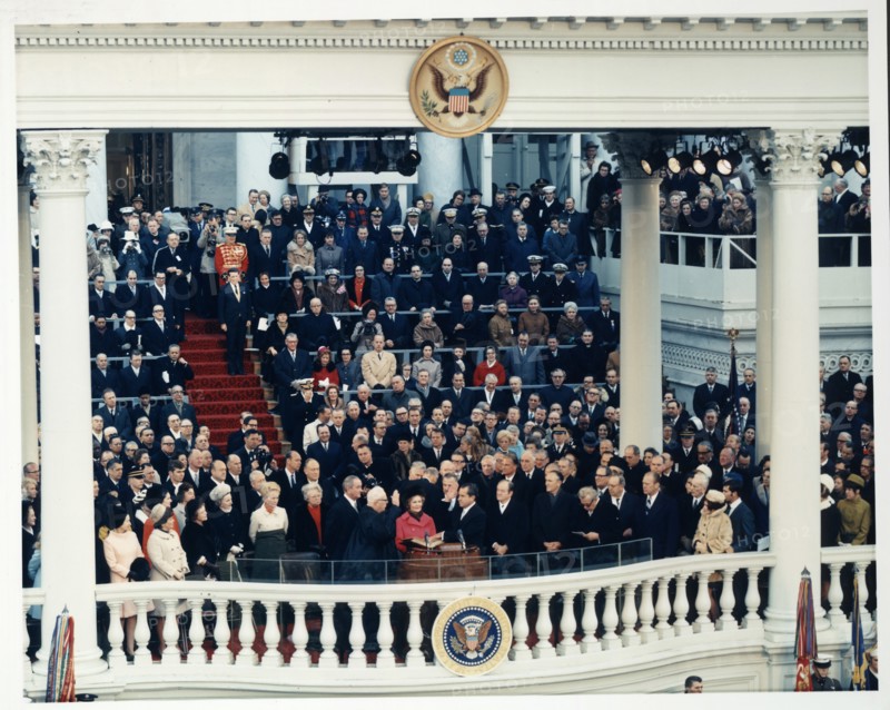Chief Justice Earl Warren administering the oath of office to Richard M. Nixon on the east portico of the U.S. Capitol, Washington DC, USA, Architect of the Capitol, January 20, 1969