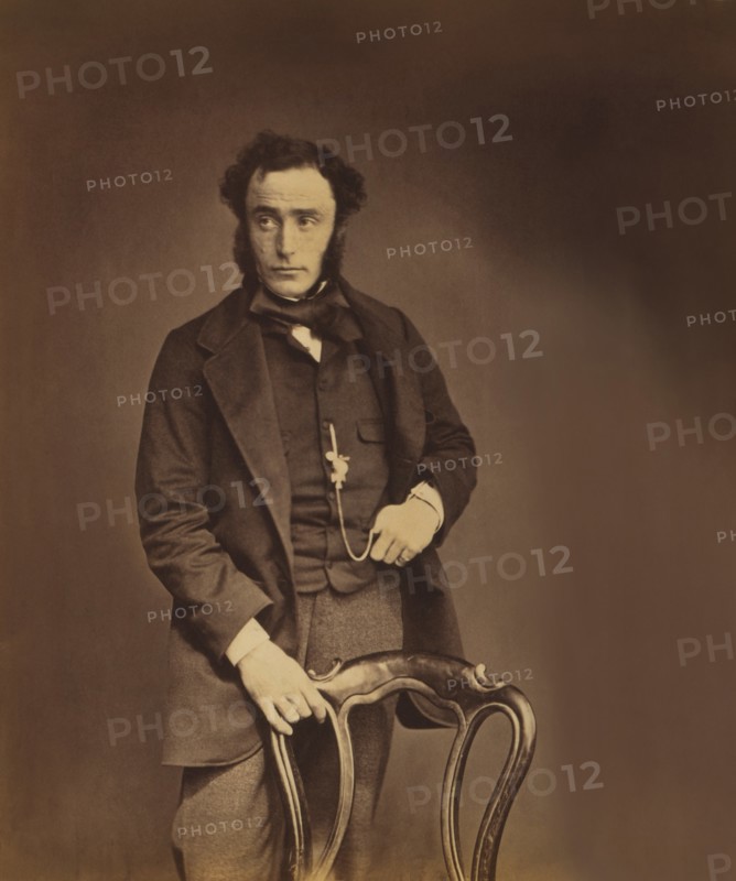 British Lieutenant-Colonel John Clarke Kennedy, 18th (Royal Irish) Regiment of Foot, Three-Quarter Length Portrait in Suit Standing Behind Chair, Crimean War, Crimea, Ukraine, by Roger Fenton, 1855