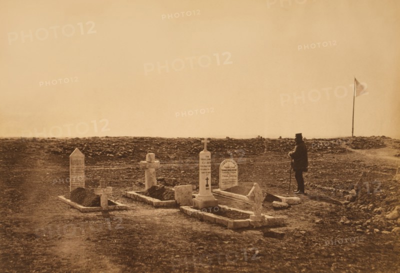 Man Standing at Cemetery Grave of British Brigadier General Thomas Leigh Goldie who was Killed in action at the Battle of Inkerman, Cathcart Hill, Crimean War, Crimea, Ukraine, by Roger Fenton, 1855
