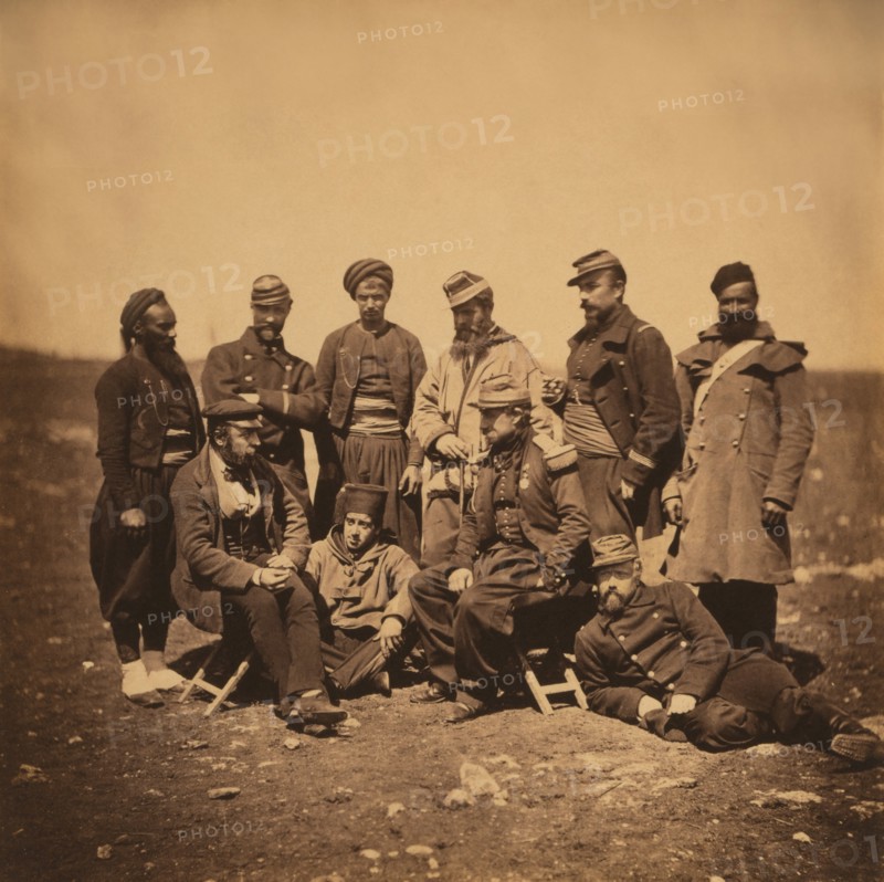 French General Cissé and group of Officers and Soldiers, Portrait in Various Styles of Uniforms; a Zouave Stands at Left, Crimean War, Crimea, Ukraine, by Roger Fenton, 1855