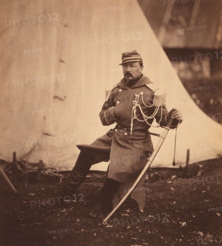 French Provost Marshal of the Division of General Bosquet, Full-Length Seated Portrait Wearing Uniform with One Hand Placed inside his Coat, Crimean War, Crimea, Ukraine, by Roger Fenton, 1855