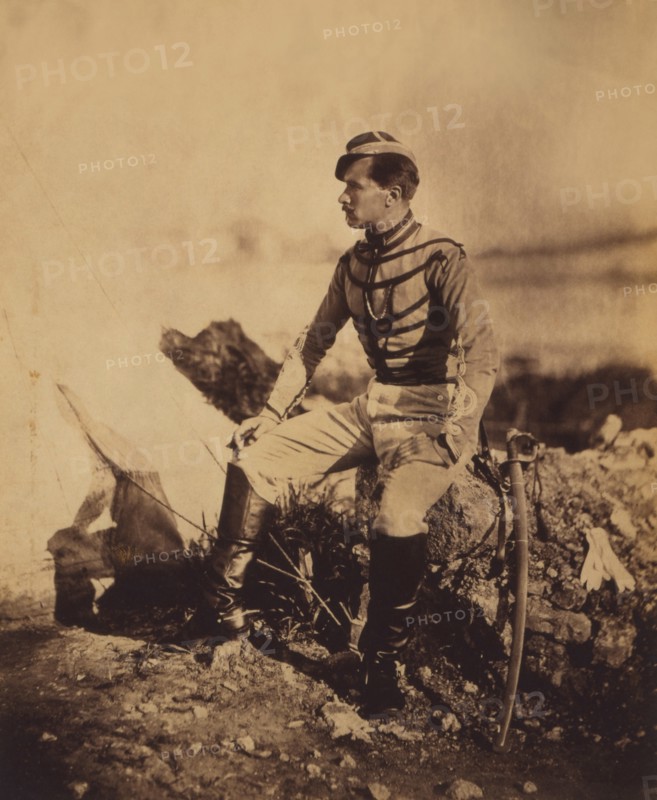 Captain Thomas, aide-de-camp to General Pierre Bosquet, Seated Full-Length Portrait in Uniform with Sword, Crimean War, Crimea, Ukraine, by Roger Fenton, 1855