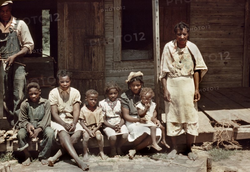 Family Portrait on Porch, Bayou Bourbeau Plantation, FSA, Cooperative, Natchitoches, Louisiana, USA, Marion Post Wolcott for Farm Security Administration, August 1940